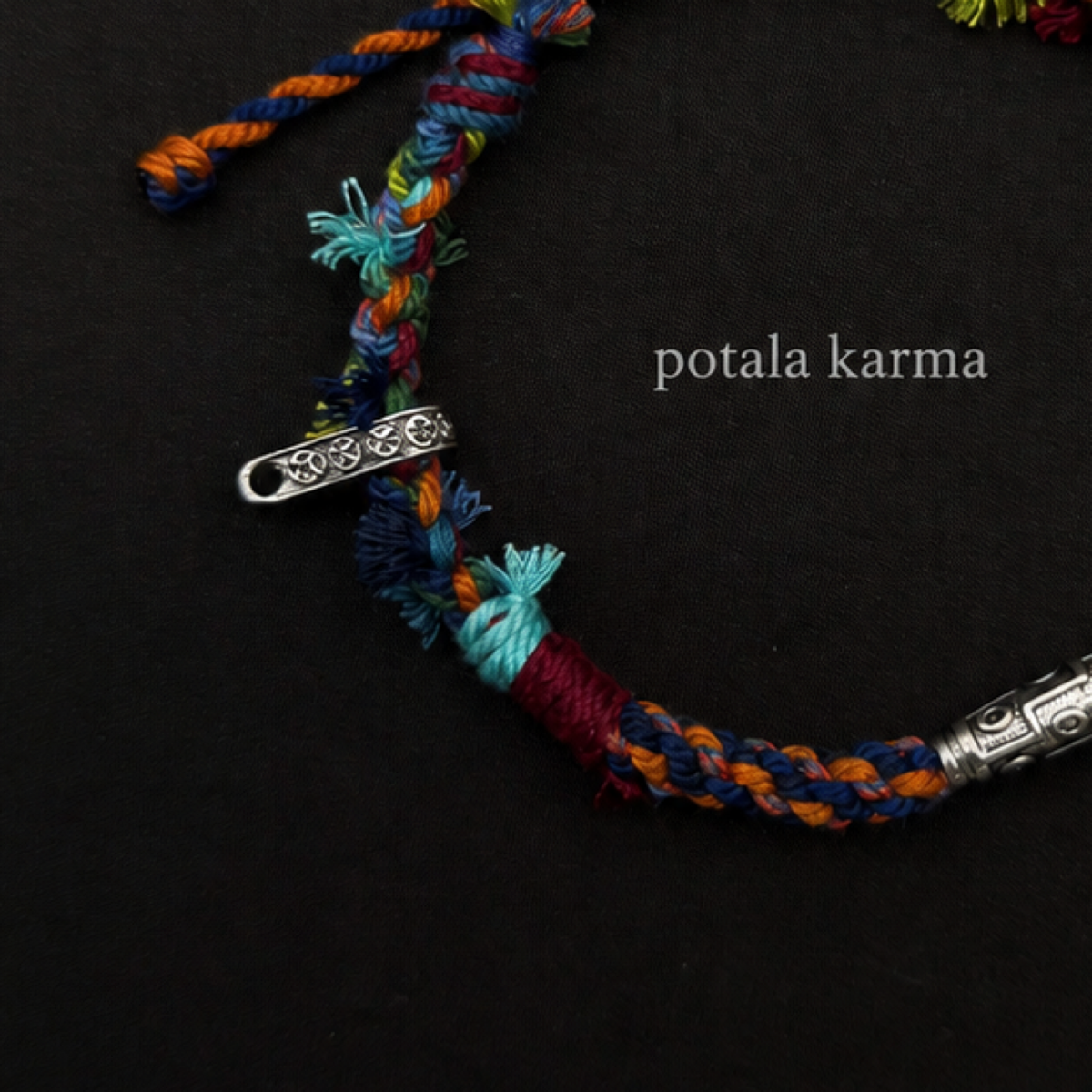 Handcrafted Turquoise & Orange Braided Charm Bracelet - hand-braided cord and material detail