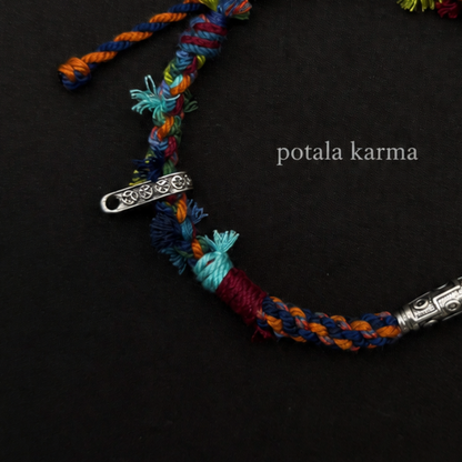 Handcrafted Turquoise & Orange Braided Charm Bracelet - hand-braided cord and material detail