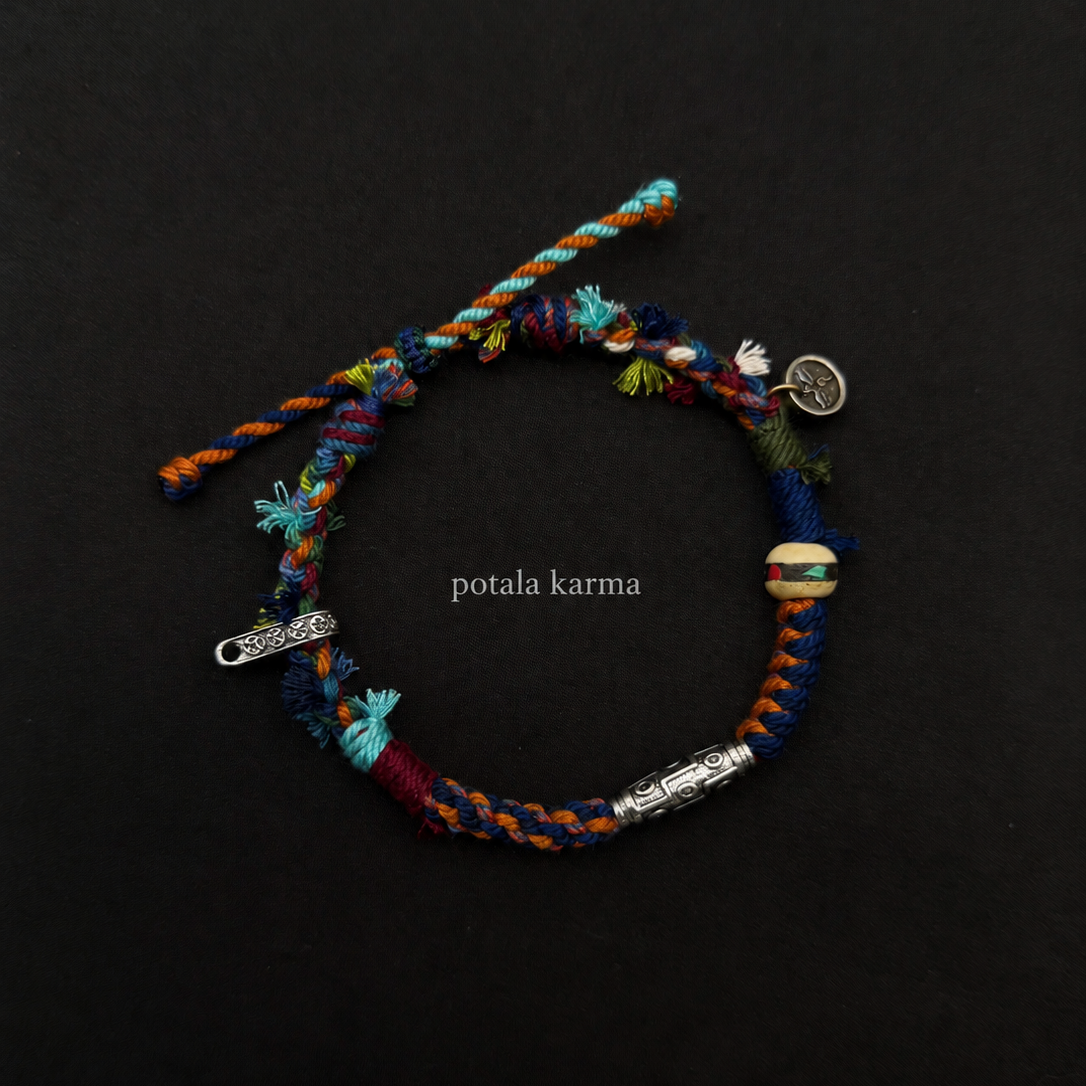 Handcrafted Turquoise & Orange Braided Charm Bracelet - front view