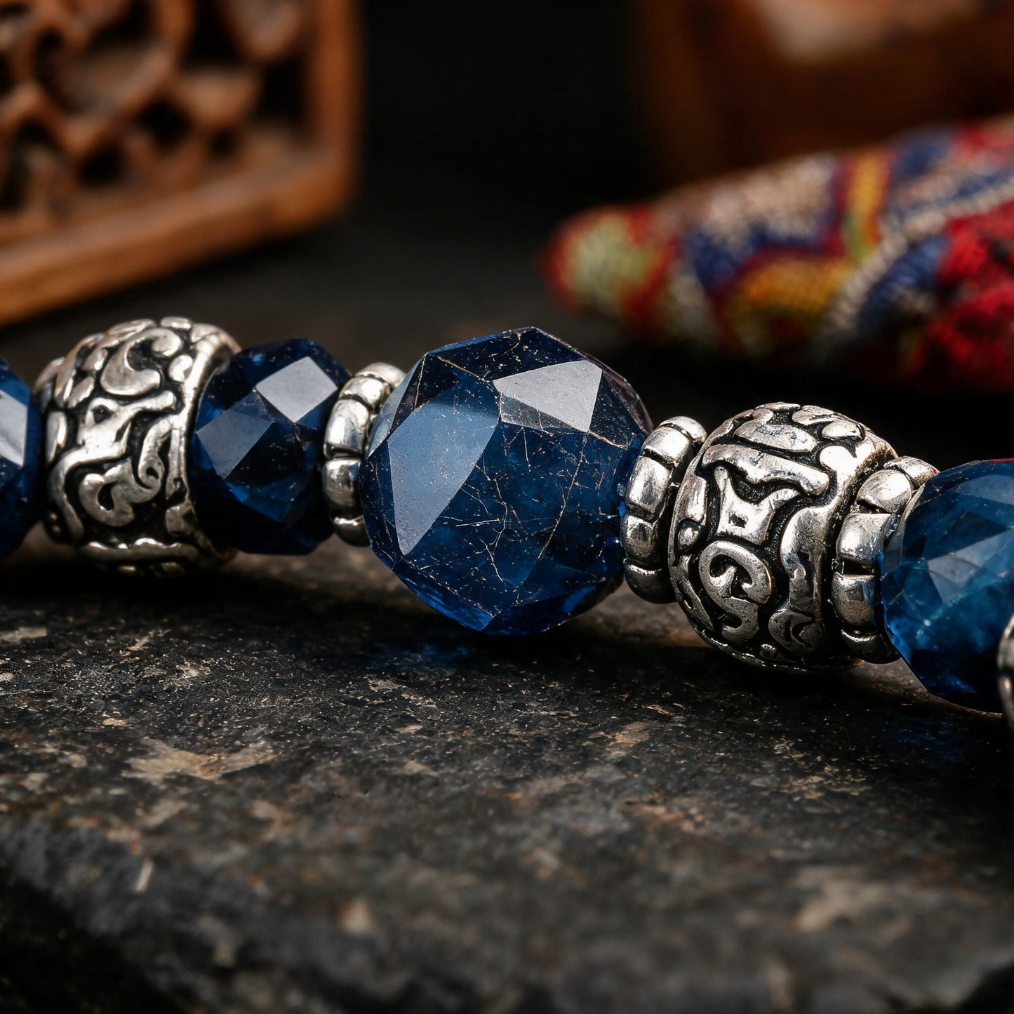 Blue Tiger Eye & Carved Bone Tibetan-Style Beaded Bracelet blue bead and carved bone detail