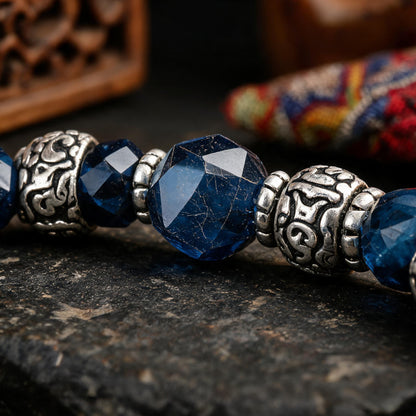 Blue Tiger Eye & Carved Bone Tibetan-Style Beaded Bracelet blue bead and carved bone detail