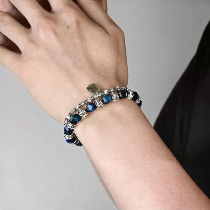 Blue Tiger Eye & Carved Bone Tibetan-Style Beaded Bracelet wearing scale view