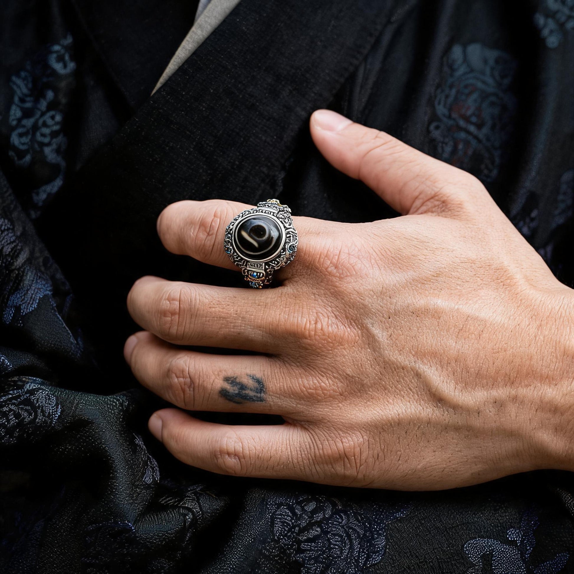 Garuda Dzi S925 silver ring worn on hand