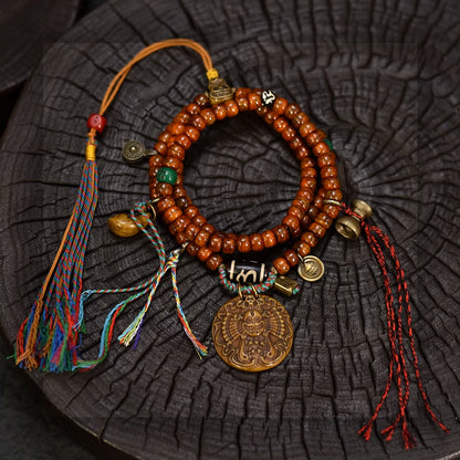 Collector grade Tibetan yak bone 108 mala with Dzi bead loop and tassel detail