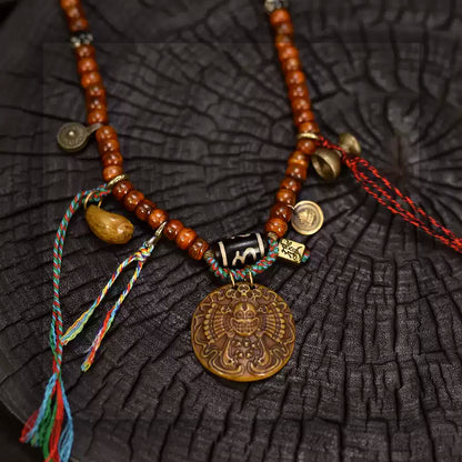 Collector grade Tibetan yak bone 108 mala with Dzi bead pendant and Dzi bead close-up