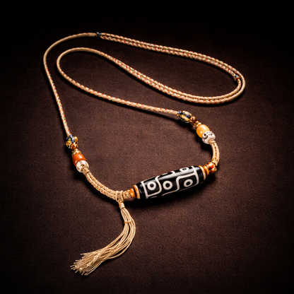 Handmade nine eye dzi bead necklace with ox bone and copper pendant main view