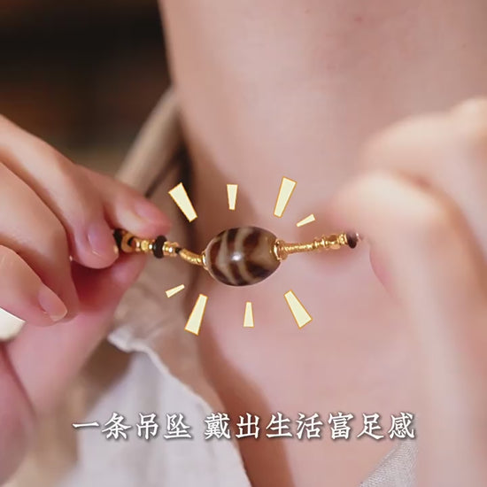 Handcrafted Three-Eye Dzi & Coconut Shell Necklace - source product video