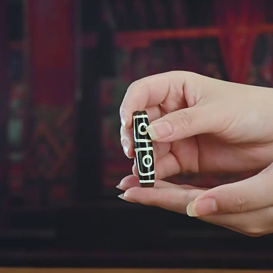 Millennium pure black and white four-eye Dzi bead source inspection video