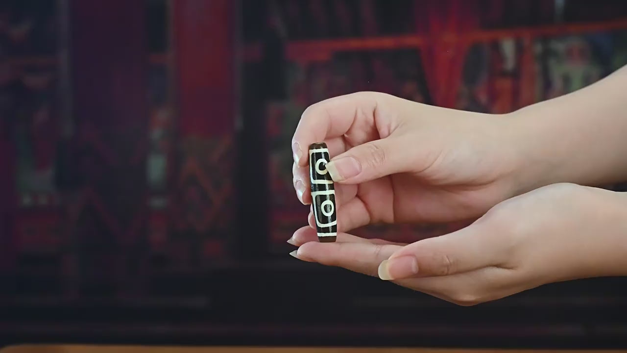 Millennium pure black and white four-eye Dzi bead source inspection video